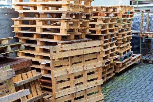 PPE kit laid out including hi-vis, gloves, boots and masks for waste operatives